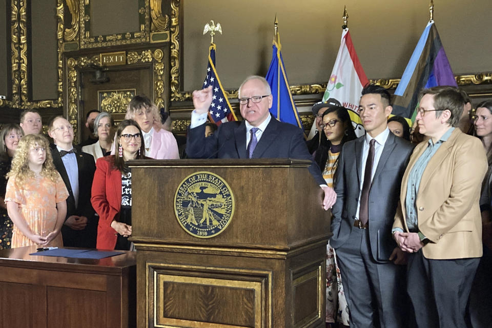 Democratic Minnesota Gov. Tim Walz speaks at a ceremony before signing an executive order on Wednesday, March 8, 2023, at the State Capitol in St. Paul, Minn., to protect the rights of LGBTQ people from Minnesota and other states to receive gender affirming health care. (AP Photo/Steve Karnowski)