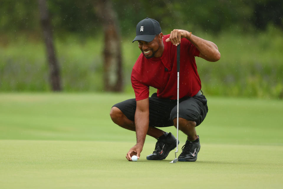 HOBE SOUND, FLORIDA - MAY 24: Tiger Woods lines up a putt  during The Match: Champions For Charity at Medalist Golf Club on May 24, 2020 in Hobe Sound, Florida. (Photo by Mike Ehrmann/Getty Images for The Match)