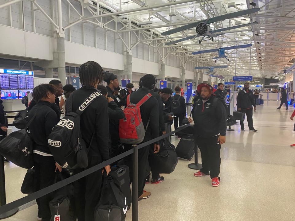 The Santaluces High School football team prepares to fly for a game against John Curtis Christian in Louisiana on Friday, Sept. 16, 2023.