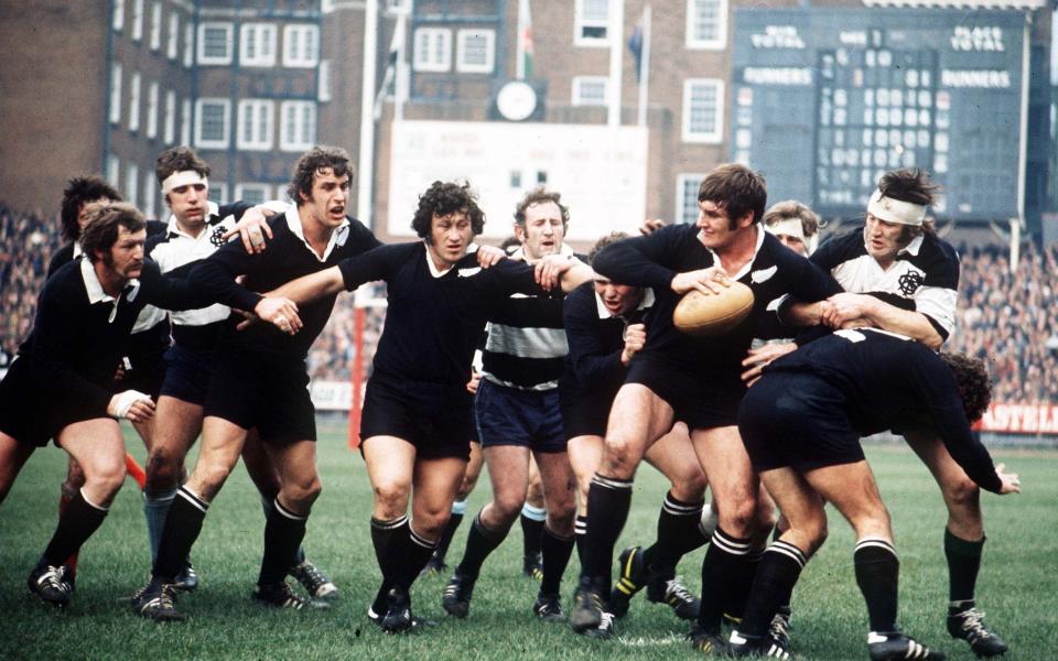 Carmichael (right in head band) in action for the Barbarians against New Zealand in 1973 - SHUTTERSTOCK