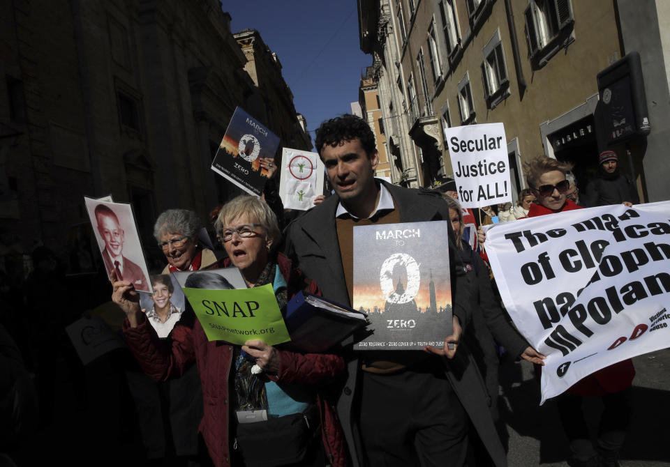 Sex abuse survivors and members of the ECA (Ending Clergy Abuse), march in downtown Rome, Saturday, Feb. 23, 2019. Pope Francis is hosting a four-day summit on preventing clergy sexual abuse, a high-stakes meeting designed to impress on Catholic bishops around the world that the problem is global and that there are consequences if they cover it up. (AP Photo/Alessandra Tarantino)