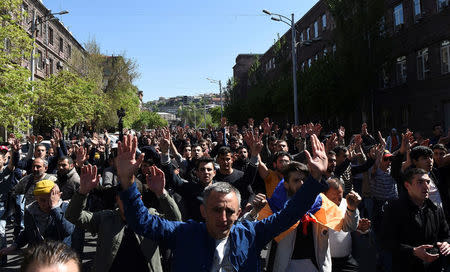 Demonstrators attend a protest against Armenia's ruling Republican party's nomination of former President Serzh Sarksyan as its candidate for prime minister, in Yerevan, Armenia April 16, 2018. Photolure/Hayk Baghdasaryan via REUTERS