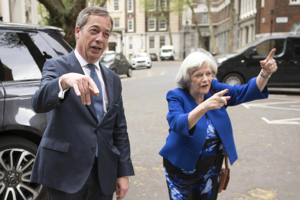 Leader of the Brexit Party Nigel Farage and former Conservative minister Ann Widdecombe, in London, Wednesday April 24, 2019. Ann Widdecombe has announced she is set to return to politics for the Brexit Party. (Stefan Rousseau/PA via AP)