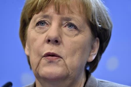 Germany's Chancellor Angela Merkel reacts during a news conference after a European Union leaders summit in Brussels, Belgium December 18, 2015. REUTERS/Eric Vidal