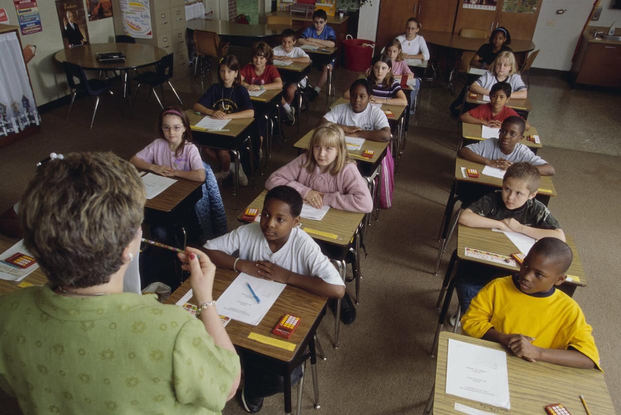 Is it time to find new language to describe racial disparities in education? <a href="https://www.gettyimages.com/detail/photo/teacher-going-over-exam-instructions-royalty-free-image/523444522?adppopup=true" rel="nofollow noopener" target="_blank" data-ylk="slk:Will & Deni McIntyre via Getty Images;elm:context_link;itc:0;sec:content-canvas" class="link ">Will & Deni McIntyre via Getty Images</a>