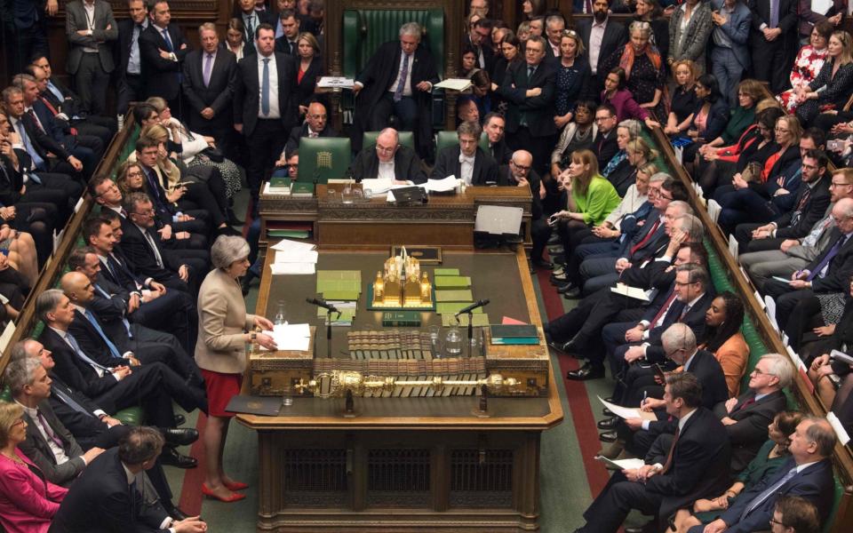 Theresa May (L) speaking during a debate in the House of Commons on the Government's Withdrawal Agreement Bill on March 29, 2019 - MARK DUFFY /AFP