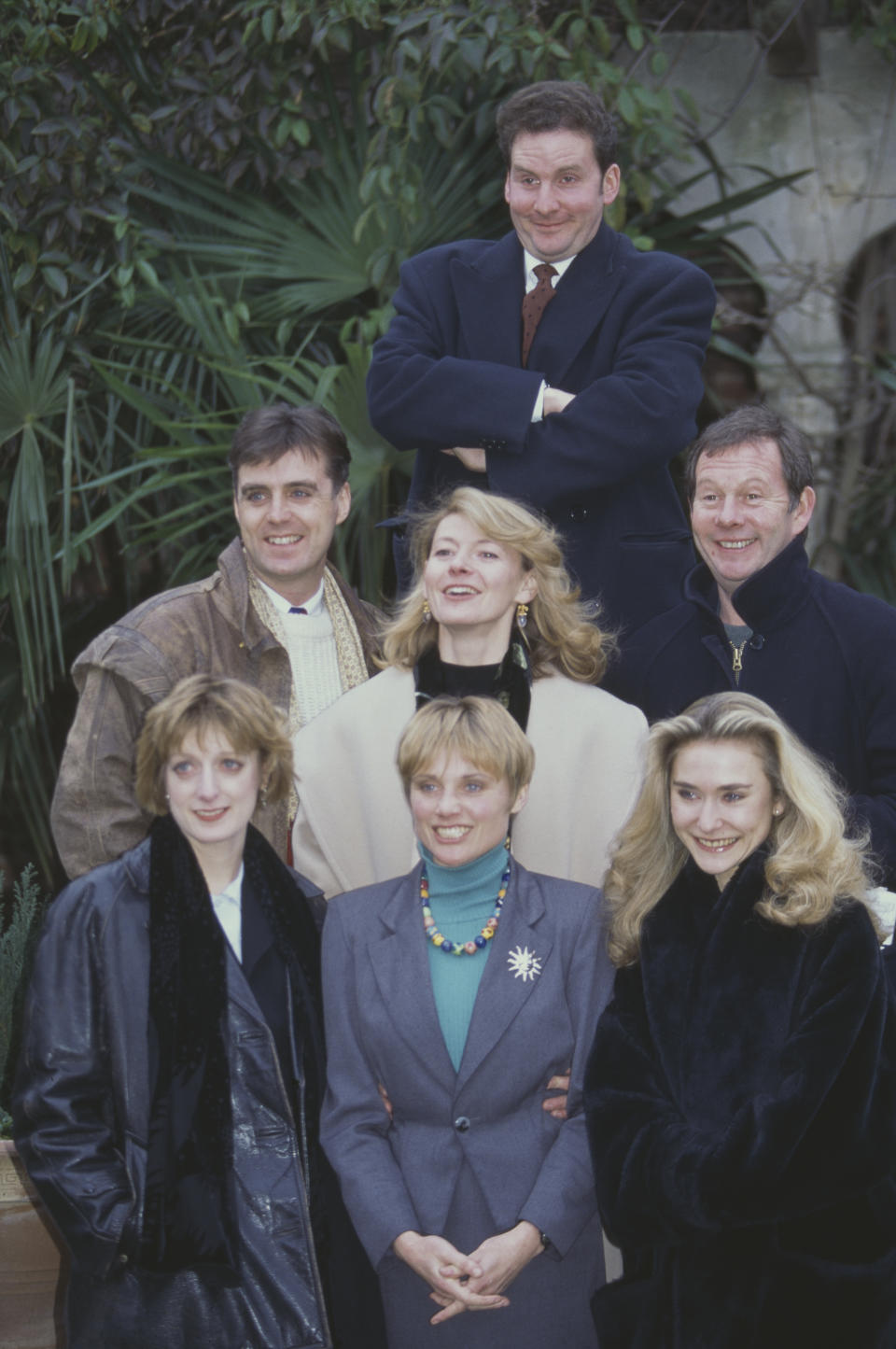 Cast of the BBC television sitcom series The Brittas Empire pictured together circa 1996. The cast are, clockwise from top: Chris Barrie, Michael Burns, Anouschka Menzies, Jill Greenacre, Judy Flynn, Tim Marriott and Pippa Haywood (centre). (Photo by Larry Ellis Collection/Getty Images)