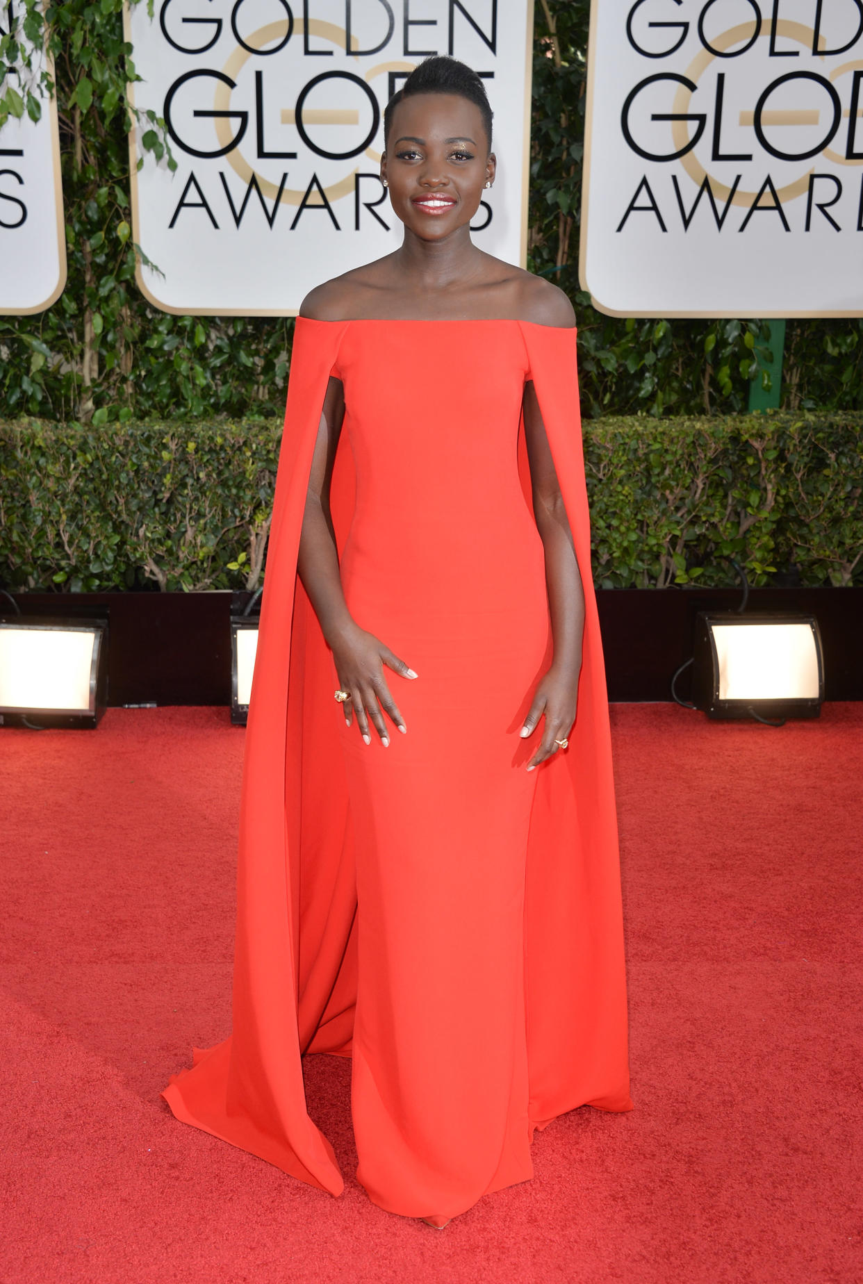 Lupita Nyong'o on the 2014 Golden Globes red carpet wearing a caped Ralph Lauren dress. (Getty Images)