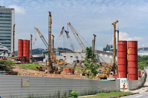 Construction machinery and workmen on the Yale-NUS college campus building site in Singapore. Yale University, one of the leading centres of liberal education in the United States, on Friday defended controversial restrictions on protests and political parties at its new Singapore campus