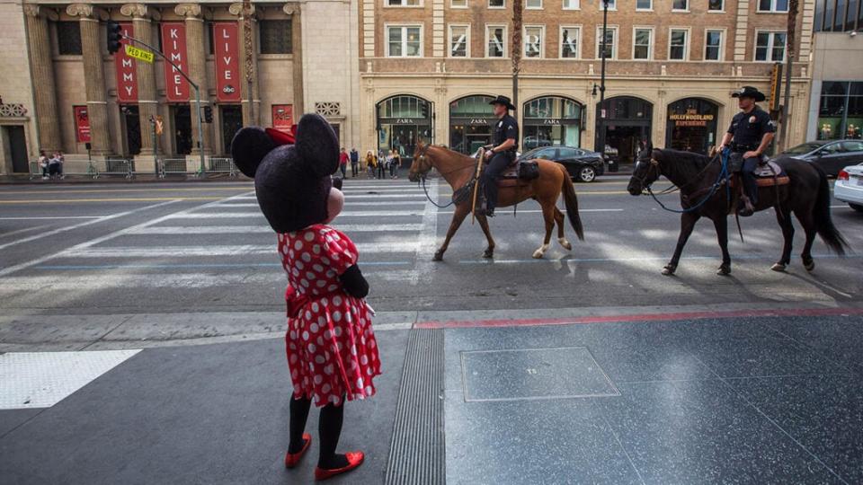 LAPD Mounted Unit officers patrol Hollywood Boulevard outside the “Jimmy Kimmel Live” studio (Getty Images)