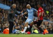 Britain Soccer Football - Manchester City v Manchester United - Premier League - Etihad Stadium - 27/4/17 Manchester City's Pablo Zabaleta in action with Manchester United's Anthony Martial as Manchester United manager Jose Mourinho looks on Action Images via Reuters / Jason Cairnduff Livepic