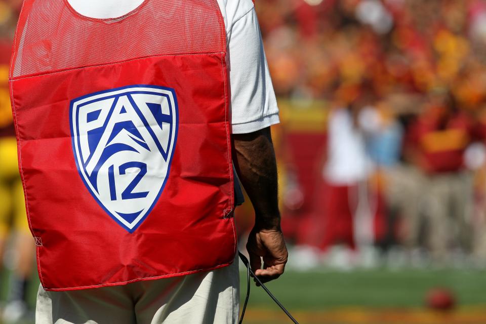 LOS ANGELES - SEPTEMBER 3: A sideline official wears a vest with the logo for the Pac 12 conference during the game between the Minnesota Golden Gophers and the USC Trojans at the Los Angeles Memorial Coliseum on September 3, 2011 in Los Angeles, California. USC won 19-17. (Photo by Stephen Dunn/Getty Images)