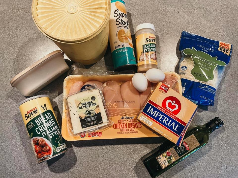 ingredients for alton brown's chicken parmesan on a kitchen counter