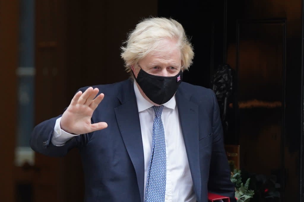 Prime Minister Boris Johnson leaves 10 Downing Street to attend Prime Minister’s Questions (PA) (PA Wire)