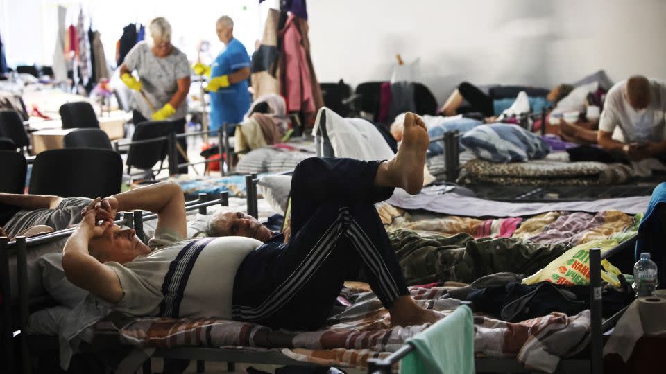 War-displaced people spend time in a centre for displaced people in undisclosed location in Kursk region on August 29, 2024, following Ukraine's cross-border offensive into Russia's western Kursk region. - Tatyana Makeyeva/AFP/Getty Images