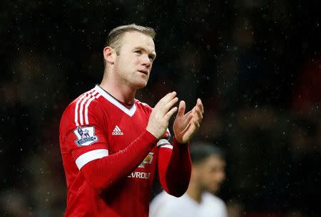 Football Soccer - Manchester United v Swansea City - Barclays Premier League - Old Trafford - 2/1/16 Manchester United's Wayne Rooney applauds the fans at the end of the match Reuters / Andrew Yates Livepic.