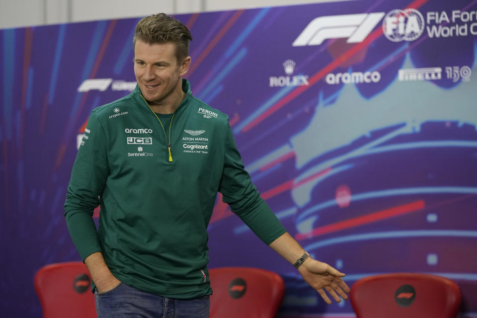 FILE - Aston Martin driver Nico Hulkenberg of Germany gestures during a press conference at the Formula One Bahrain International Circuit in Sakhir, Bahrain on March 18, 2022. Mick Schumacher, son of seven-time Formula One champion Michael Schumacher, is out at Haas and Nico Hulkenberg will return to the grid full-time next season in his place. (AP Photo/Hassan Ammar, File)