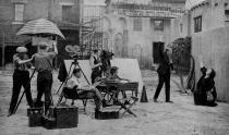 <p>A Hollywood film crew prepares to shoot a scene for a movie in a studio backlot.</p>