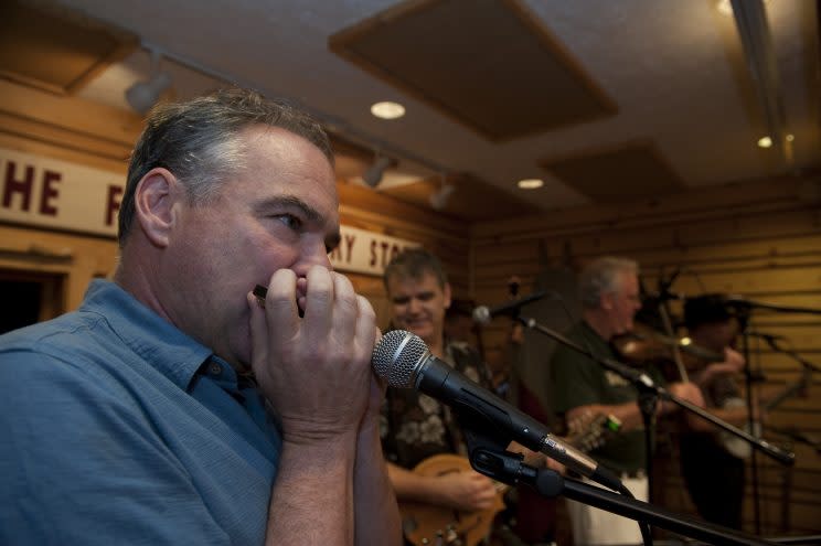 Then-Gov. Tim Kaine plays the harmonica for a packed house at the Floyd Country Store in Floyd, Va. (Photo: Douglas Graham/CQ Roll Call)