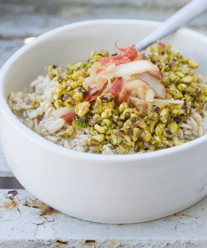 <p>Coconut and pear bircher oats with grated apple and crushed pistachios</p>