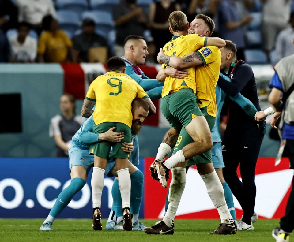 Soccer Football - FIFA World Cup Qatar 2022 - Group D - Australia v Denmark - Al Janoub Stadium, Al Wakrah, Qatar - November 30, 2022 Australia players celebrate qualifying for the knockout stages REUTERS/Hamad I Mohammed