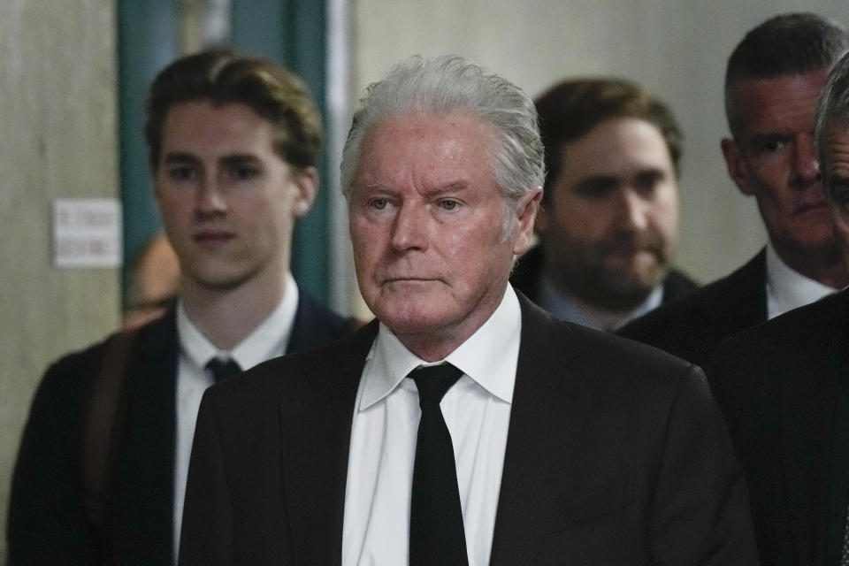 Musician Don Henley arrives to court in New York, Tuesday, Feb. 27, 2024. Henley says he never gave away his handwritten pages of draft lyrics to “Hotel California” and other Eagles hits. Testifying Monday in a New York courtroom, the Eagles' singer and drummer called the pages “very personal. (AP Photo/Seth Wenig)