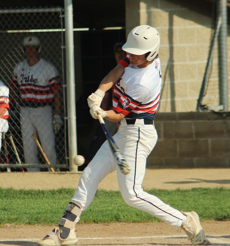 Pontiac's Michael Kuska makes contact against Manteno. Kuska had two hits and drove in two runs in the Tribe's loss to the Panthers.