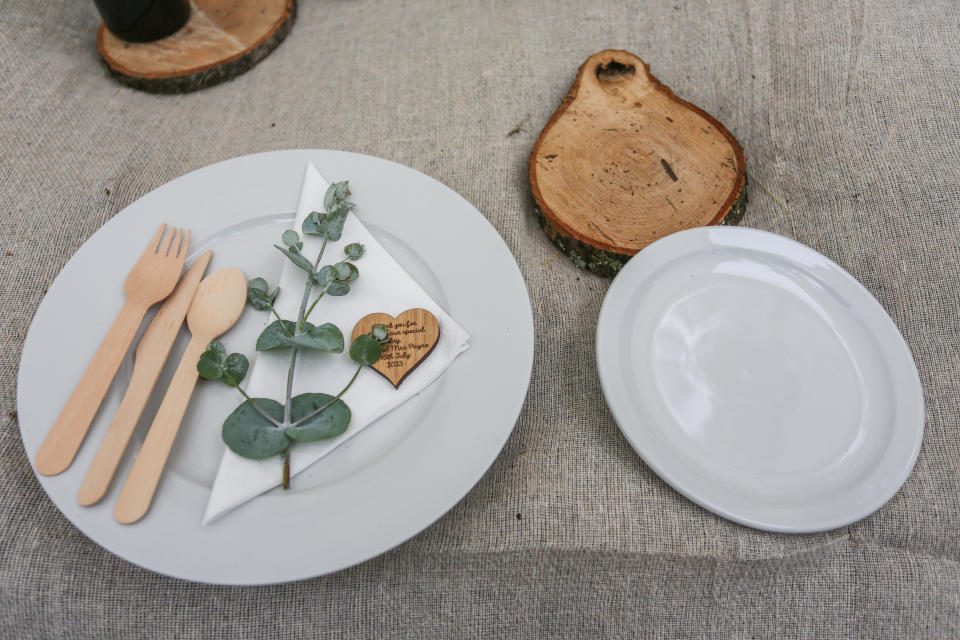 The couple chose to use biodegradable cutlery and sustainable decor. (SWNS)