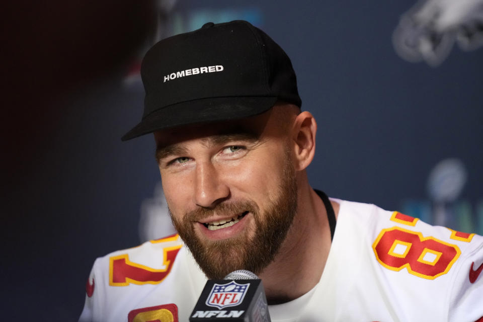 Kansas City Chiefs' Travis Kelce smiles as he answers a question during an NFL football Super Bowl media availability in Scottsdale, Ariz., Tuesday, Feb. 7, 2023. The Chiefs will play against the Philadelphia Eagles in Super Bowl 57 on Sunday. (AP Photo/Ross D. Franklin)