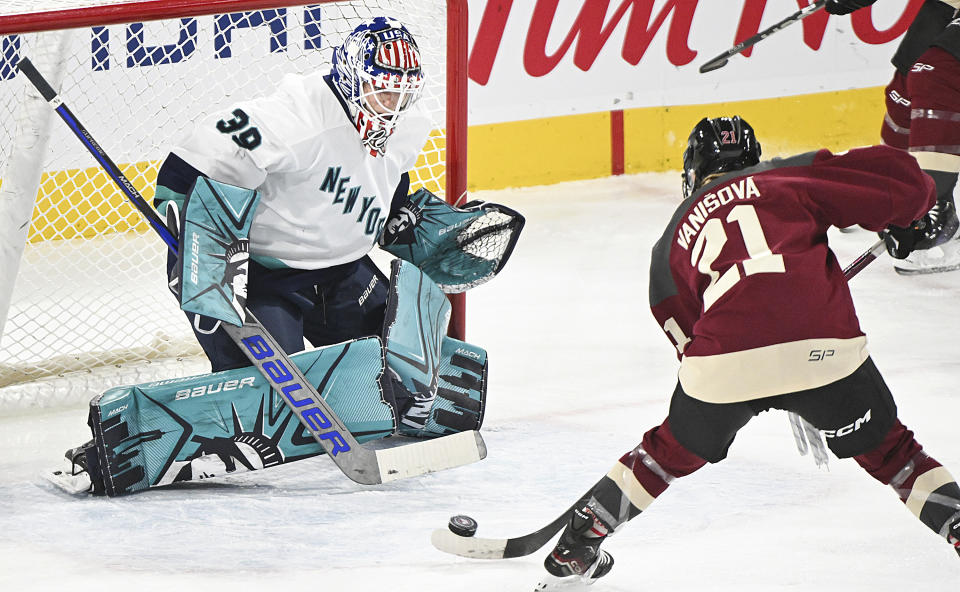 Montreal's Tereza Vanisova shoots on New York goaltender Abigail Levy during the first period of a PWHL hockey game Tuesday, Jan. 16, 2024, in Laval, Quebec. (Graham Hughes/The Canadian Press via AP)