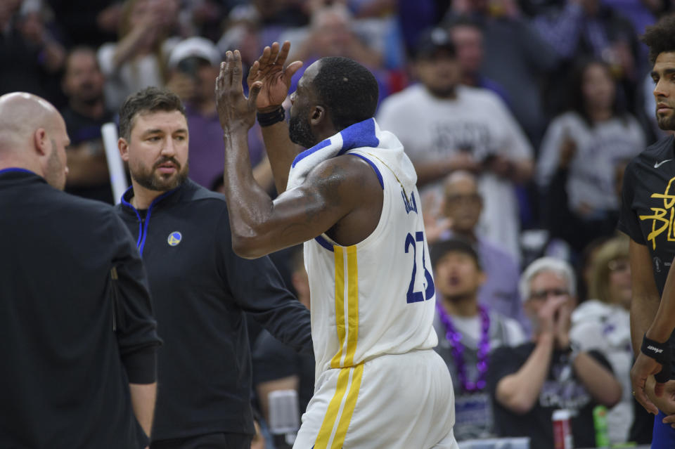 Golden State Warriors forward Draymond Green reacts after he was ejected from Game 2 in the first round of the NBA basketball playoffs after stomping on the chest of Sacramento's Domantas Sabonis, Monday, April 17, 2023, in Sacramento, Calif. (AP Photo/Randall Benton)