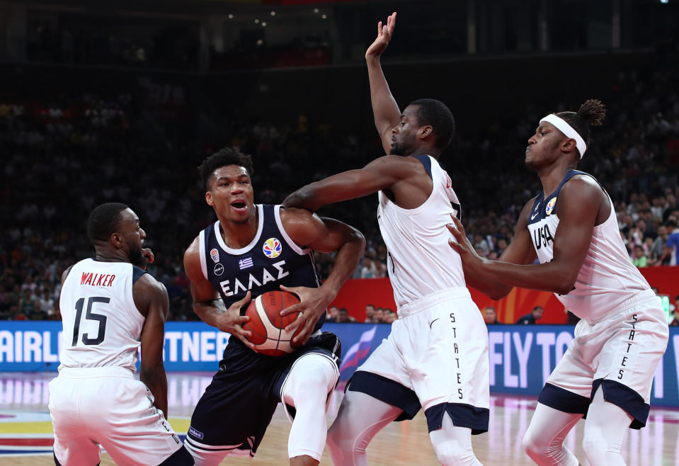 Basketball - FIBA World Cup - Second Round - Group K - United States v Greece - Shenzhen Bay Sports Center, Shenzhen, China - September 7, 2019  Greece's Giannis Antetokounmpo in action with Kemba Walker, Harrison Barnes and Myles Turner of the U.S. REUTERS/Athit Perawongmetha