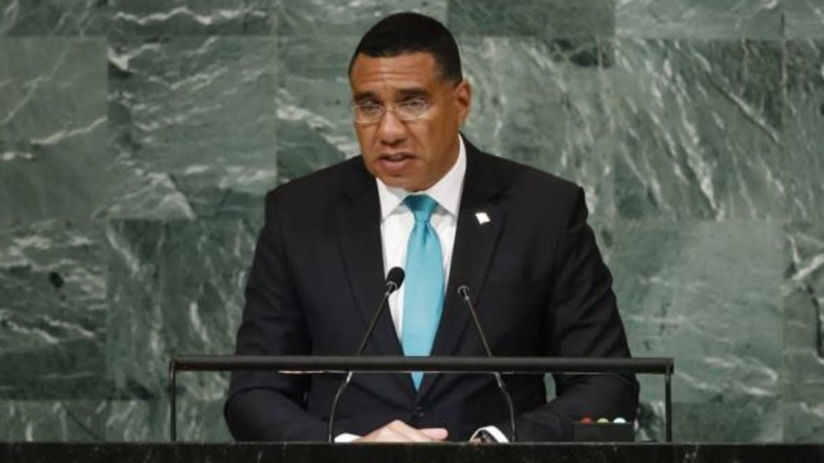 Prime Minister of Jamaica Andrew Holness addresses the 77th session of the United Nations General Assembly at U.N. headquarters in September. A top prosecutor in Jamaica ruled Thursday that Holness won’t face charges over possible conflict of interest in contracts awarded to a construction company in 2007-2009 while he was education minister. (Photo: Jason DeCrow/AP, File)