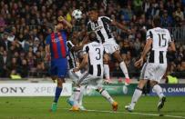 Football Soccer - FC Barcelona v Juventus - UEFA Champions League Quarter Final Second Leg - The Nou Camp, Barcelona, Spain - 19/4/17 Barcelona's Luis Suarez in action with Juventus' Alex Sandro Reuters / Sergio Perez Livepic