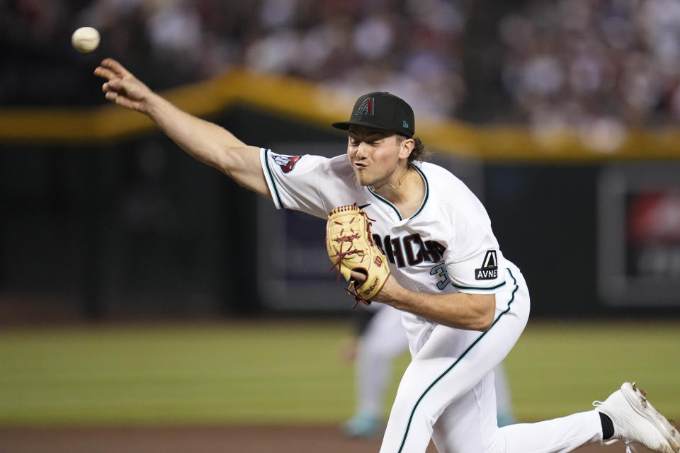 Arizona Diamondbacks starting pitcher Brandon Pfaadt works against a Los Angeles Dodgers batter during the fourth inning in Game 3 of a baseball NL Division Series, Wednesday, Oct. 11, 2023, in Phoenix. (AP Photo/Ross D. Franklin)