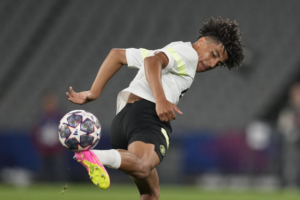 Manchester City's Rico Lewis controls the ball during a training session at the Ataturk Olympic Stadium in Istanbul, Turkey, Friday, June 9, 2023. Manchester City and Inter Milan are making their final preparations ahead of their clash in the Champions League final on Saturday night. (AP Photo/Antonio Calanni)