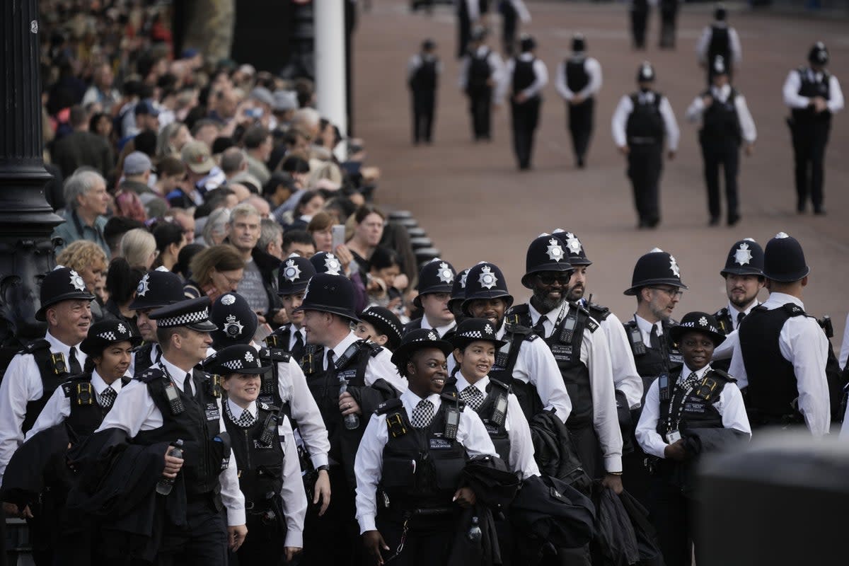 Police officers ahead of the ceremonial procession of the coffin of Queen Elizabeth II from Buckingham Palace to Westminster Hall (Vadim Ghirda/PA) (PA Wire)