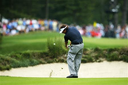 Phil Mickelson of the U.S. hits from the fifth fairway during the first round of the Deutsche Bank Championship golf tournament in Norton, Massachusetts August 30, 2013. REUTERS/Brian Snyder