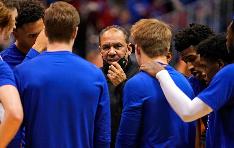 Kansas men's basketball assistant coach Kurtis Townsend talks to the team before a Jan. 11 game against Iowa State at Allen Fieldhouse. Townsend, like Jayhawks head coach Bill Self, is the subject of a NCAA infractions case.