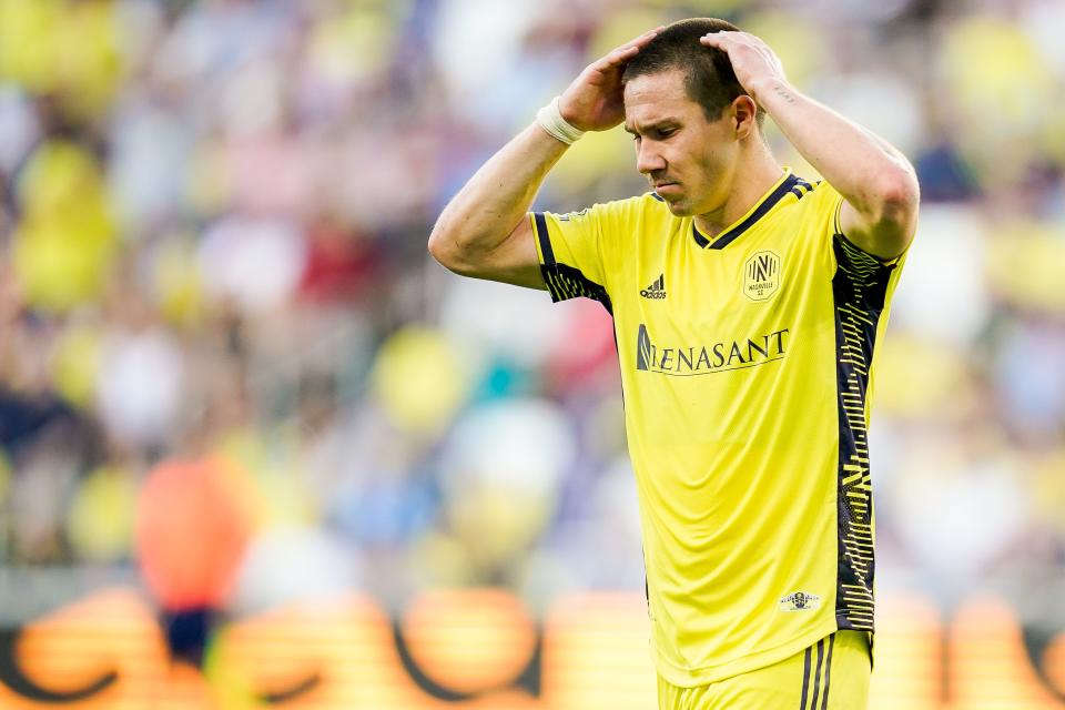 Nashville SC midfielder Alex Muyl (19) reacts after his kick missed the goal during the second half against Sporting Kansas City at Geodis Park in Nashville, Tenn., Sunday, June 19, 2022.