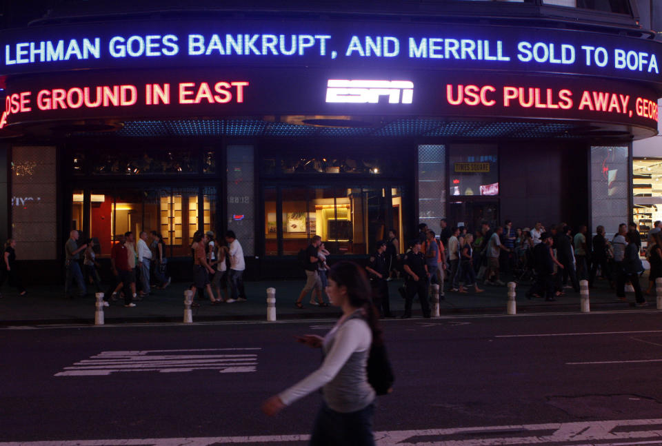 The Lehman Brothers name moves across a news ticker in Times Square in New York City on Sept. 15, 2008. (Photo: Joshua Lott/Reuters)