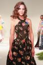 Loved up and looking fine, Katie Holmes went for pretty black floral for her place on the FROW.