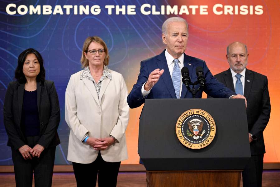 U.S. President Joe Biden, joined by acting Labor Secretary Julie Su, FEMA Administrator Deanne Criswell, and National Oceanic and Atmospheric Administration (NOAA) Administrator Dr. Rick Spinrad, speaks on July 27, 2023, during a briefing on extreme heat conditions, in the South Court Auditorium of the Eisenhower Executive Office Building, next to the White House, in Washington, D.C. (Photo by MANDEL NGAN/AFP via Getty Images)