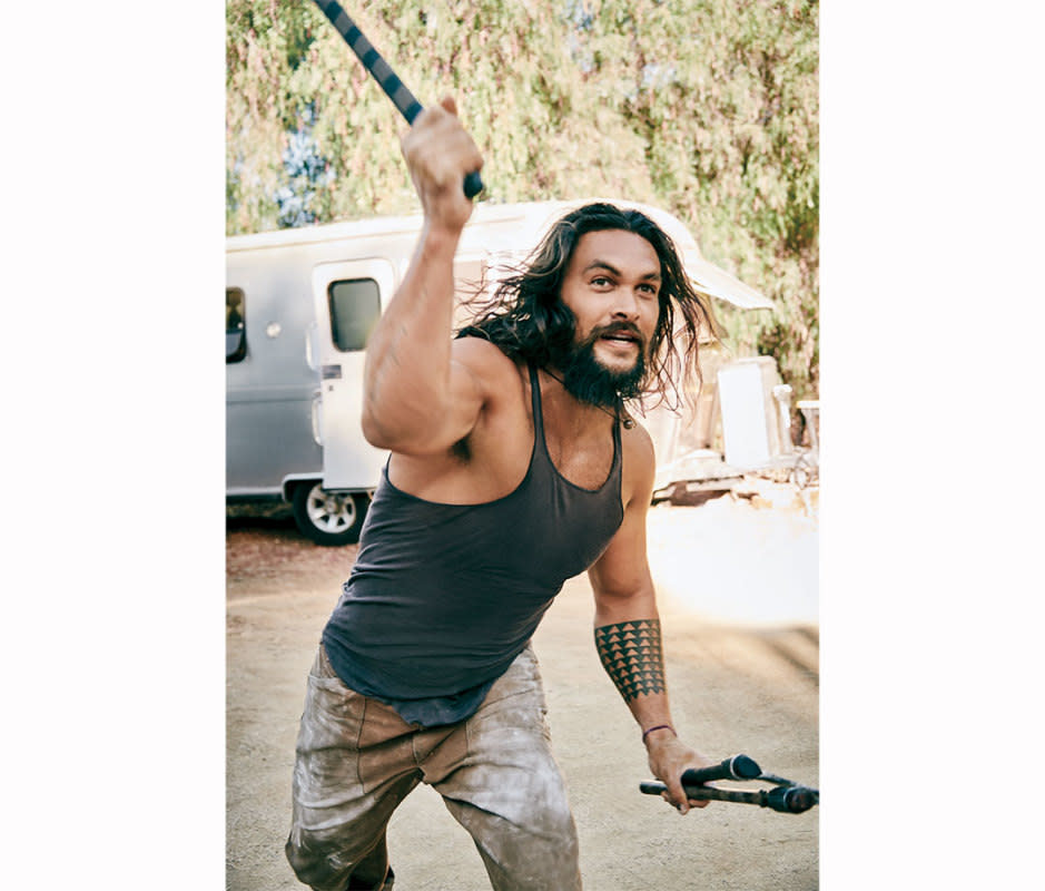 Momoa throwing axes at home.<p>Jeff Lipsky for Men's Journal</p>