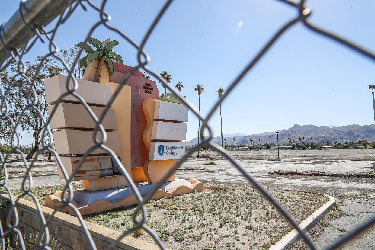 A large plot of land intended for a College of the Desert campus sits vacant and fenced off at South Farrell Drive and East Tahquitz Canyon Way in Palm Springs, Calif., on Feb. 16, 2022.  The land at one time was home to the Palm Springs Mall.