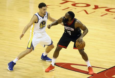 May 16, 2018; Houston, TX, USA; Houston Rockets guard James Harden (13) controls the ball against Golden State Warriors guard Klay Thompson (11) during the first half in game two of the Western conference finals of the 2018 NBA Playoffs at Toyota Center. Mandatory Credit: Troy Taormina-USA TODAY Sports
