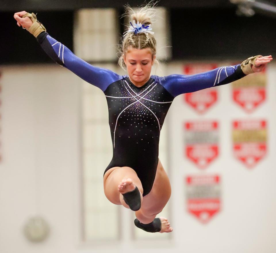 West Bend West’s Mel Princl leaps during a routine at the 2023 Manitowoc Ships Holiday Gymnastics Invitational on Dec. 9.