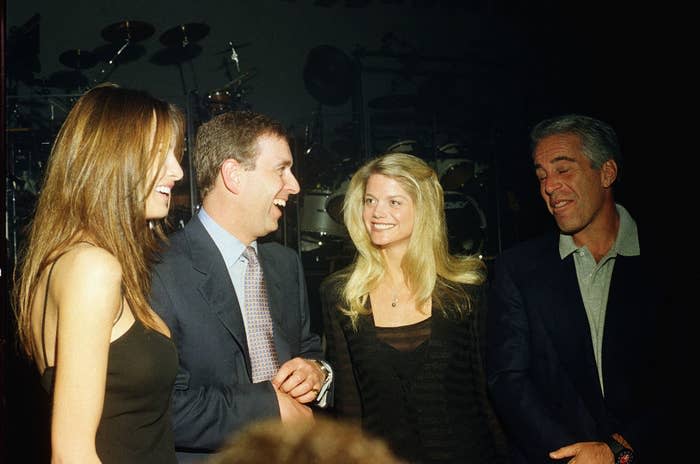 Andrew and Epstein smiling as they talk to two women