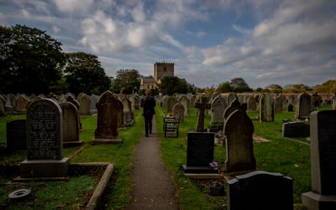 In Finland, tradition dictates a Christmas Eve trip to the graveyard to pay respects to the dead - Credit: Charlotte Graham/CAG Photography