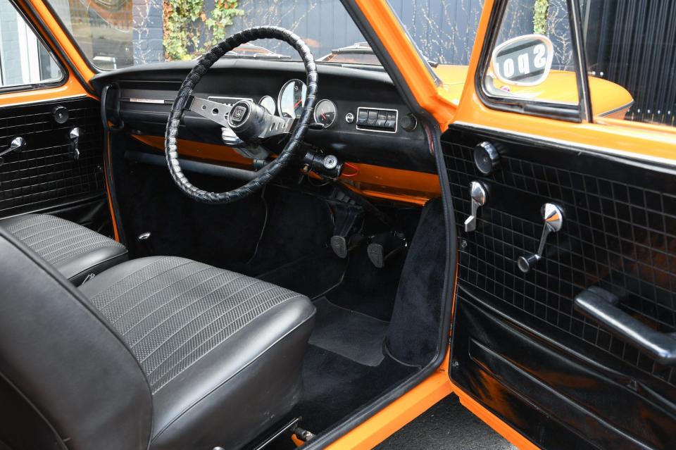 An Autocar review in 1969 favoured the 1200TT over the comparable Mini Cooper 1275GT, noting its cigarette lighter, steering column lock and two-speed wipers